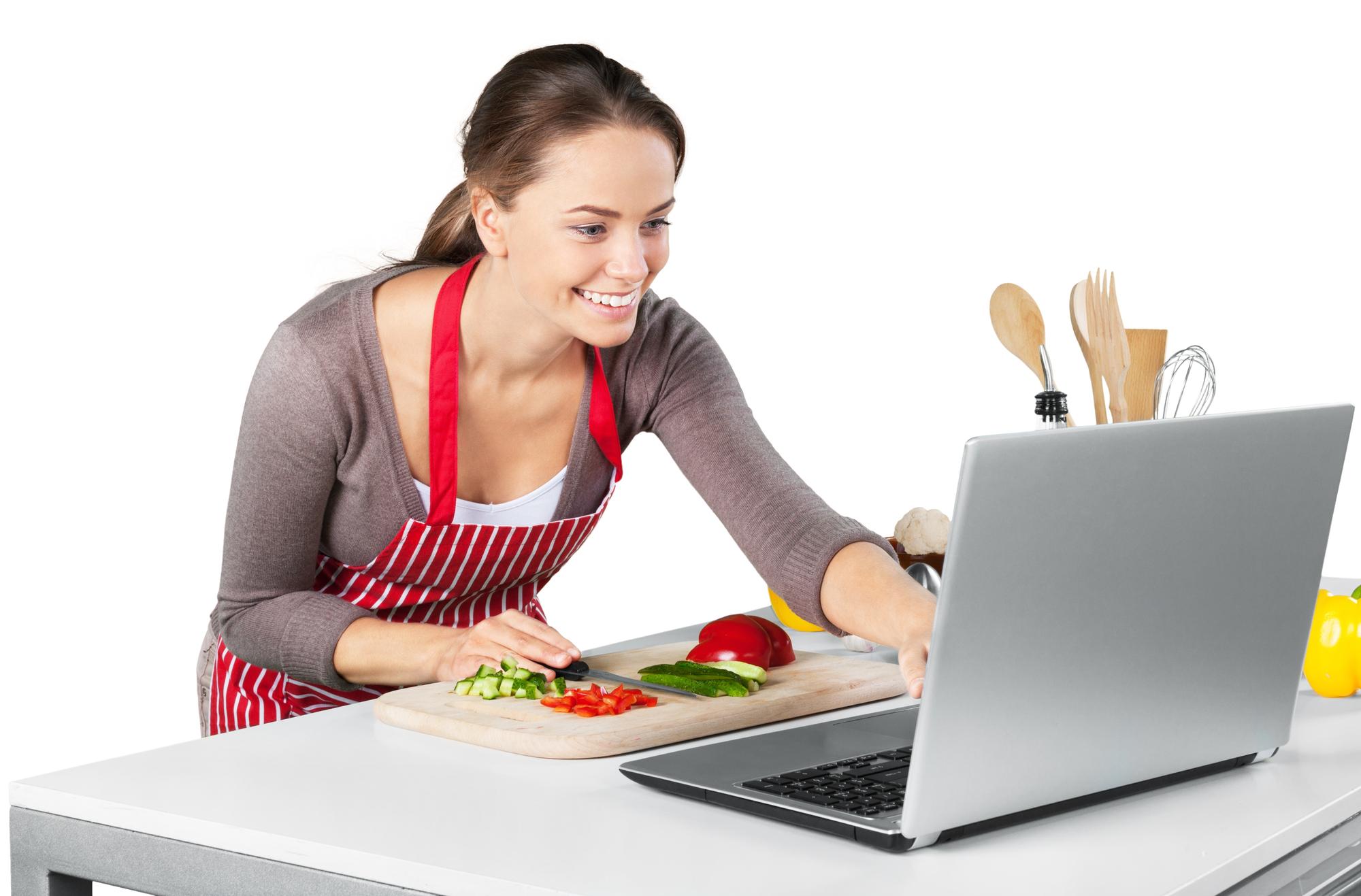 Instructor consulting with student over a recipe