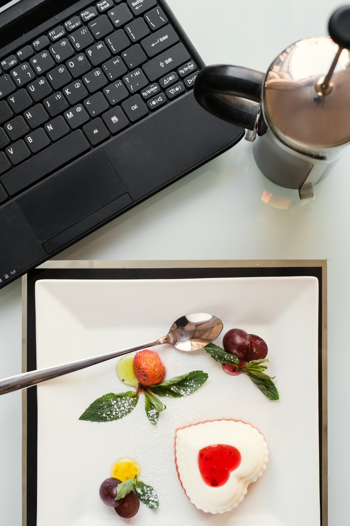 Flat lay of course materials and plated sample